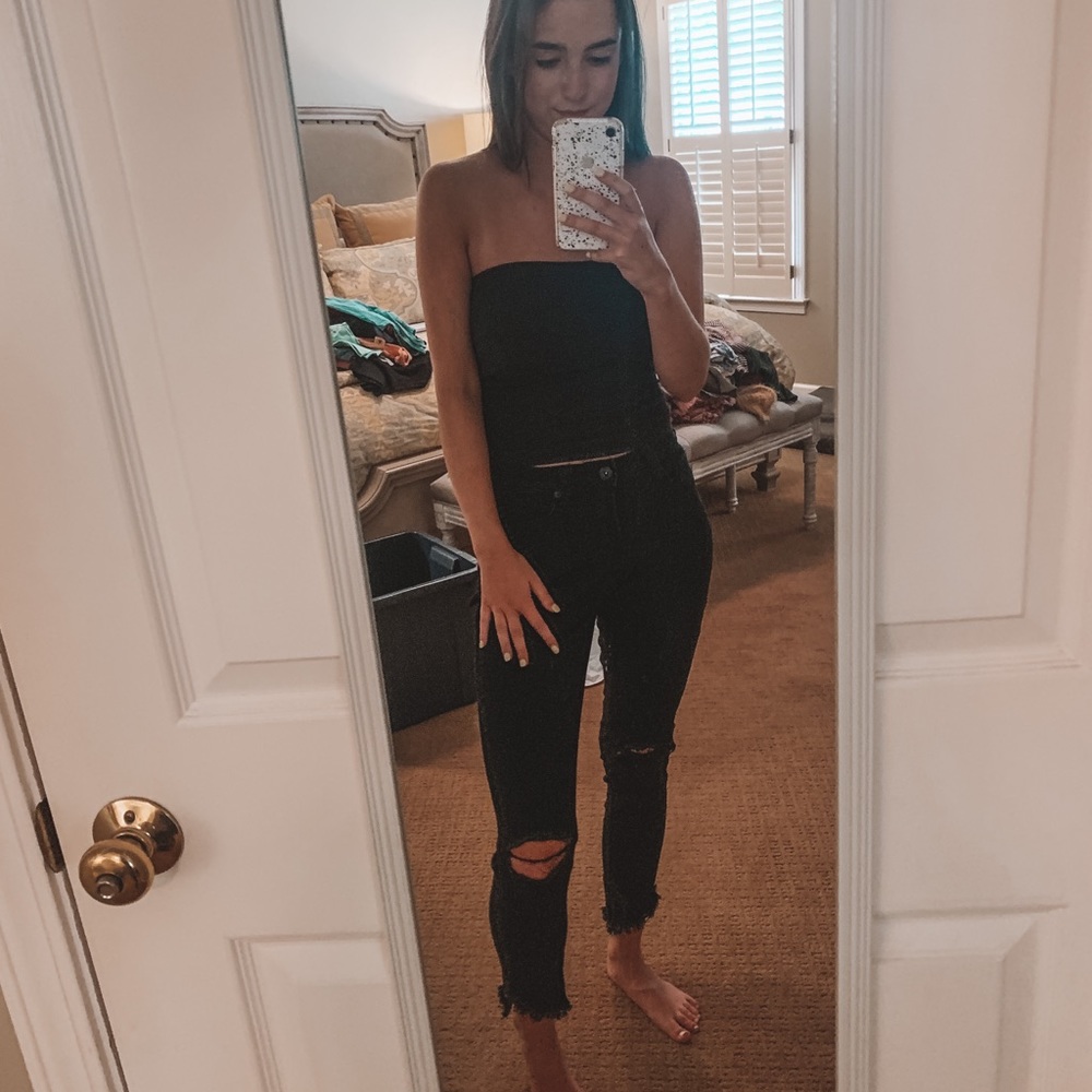 ripped knee black jeans